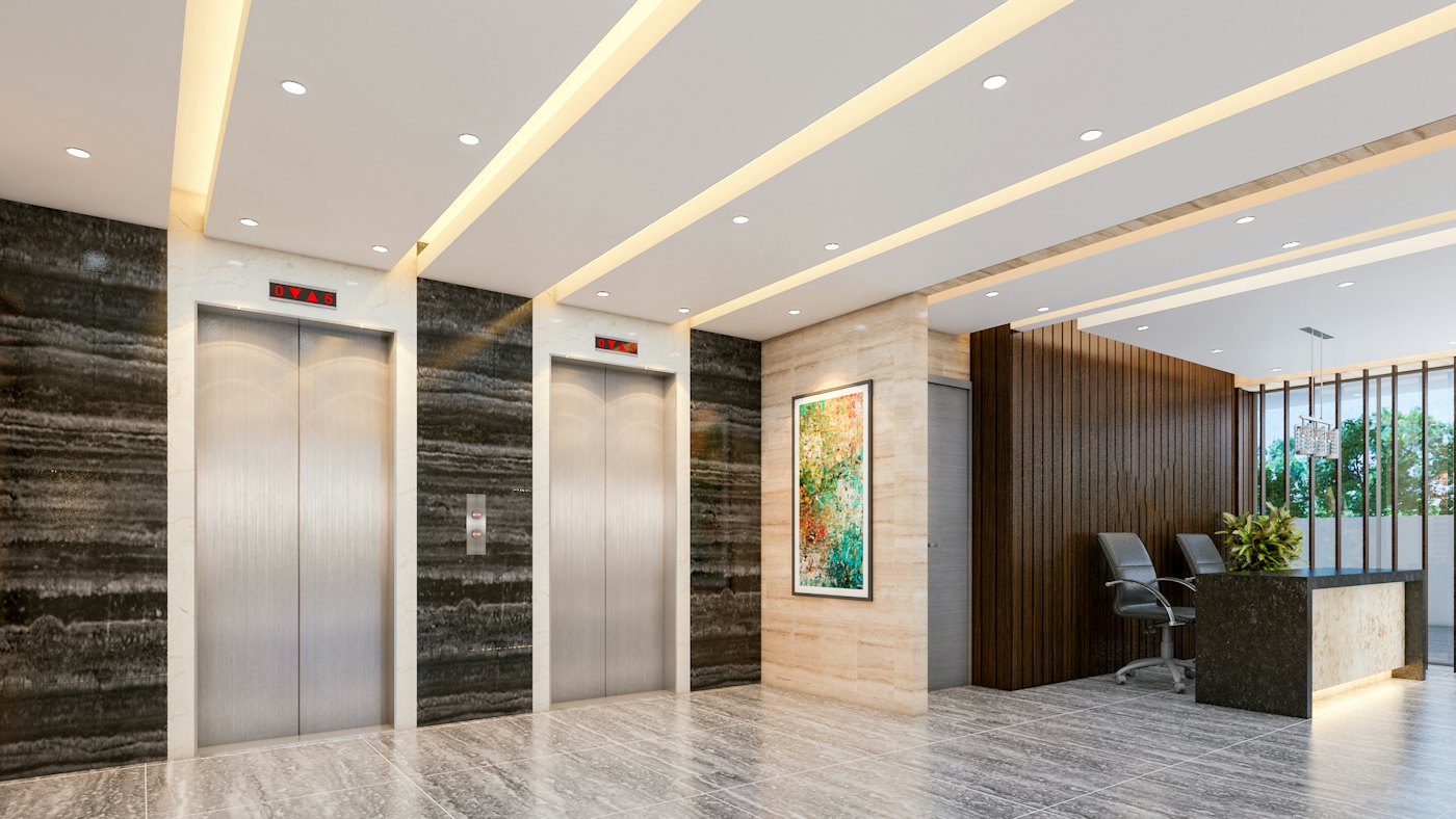 A clean, brightly lit lobby with lifts and a reception desk